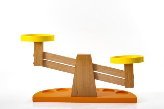 Seesaw toy scale that is unbalanced